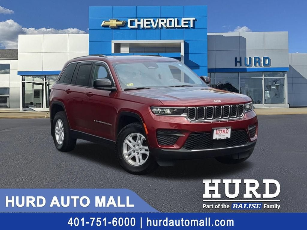 2023 Jeep Grand Cherokee Laredo 4x4 in Red — front three-quarter view