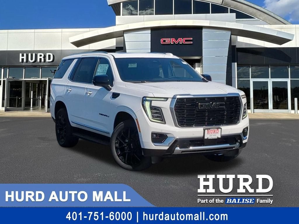 2026 GMC Yukon Denali in Summit White — front three-quarter view