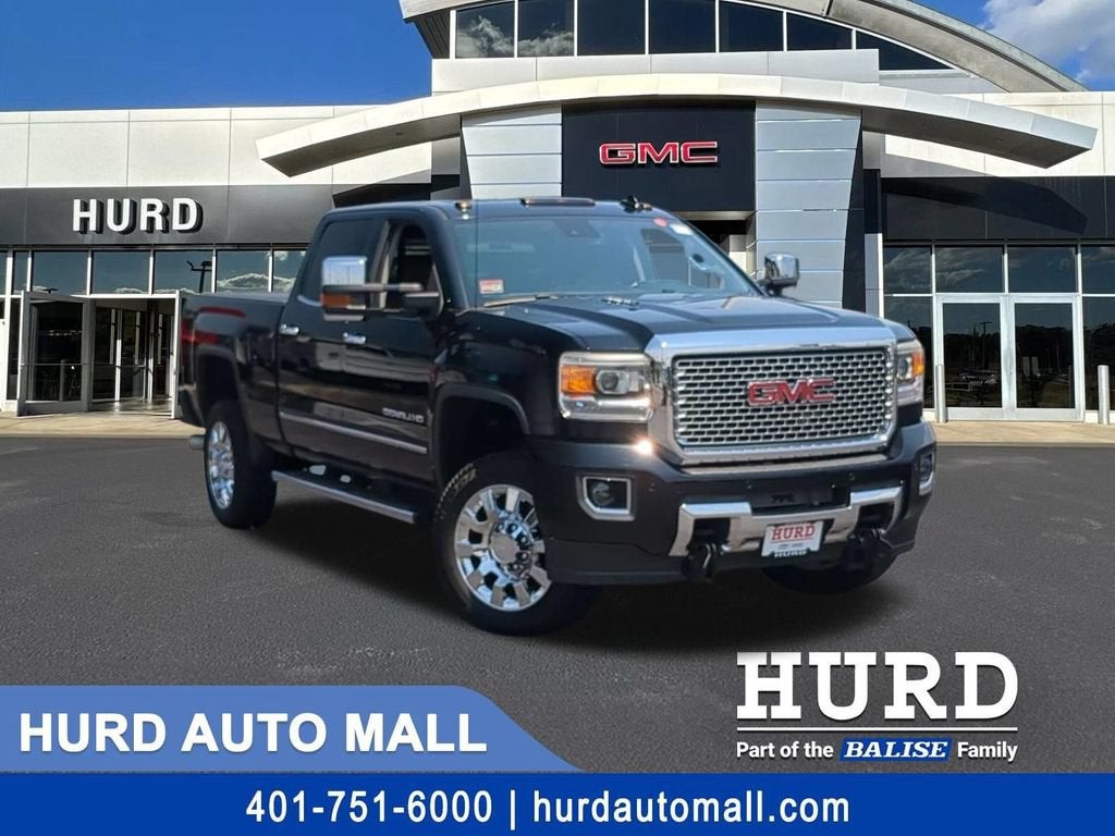 2016 GMC Sierra 2500 HD Denali in Onyx Black — front three-quarter view