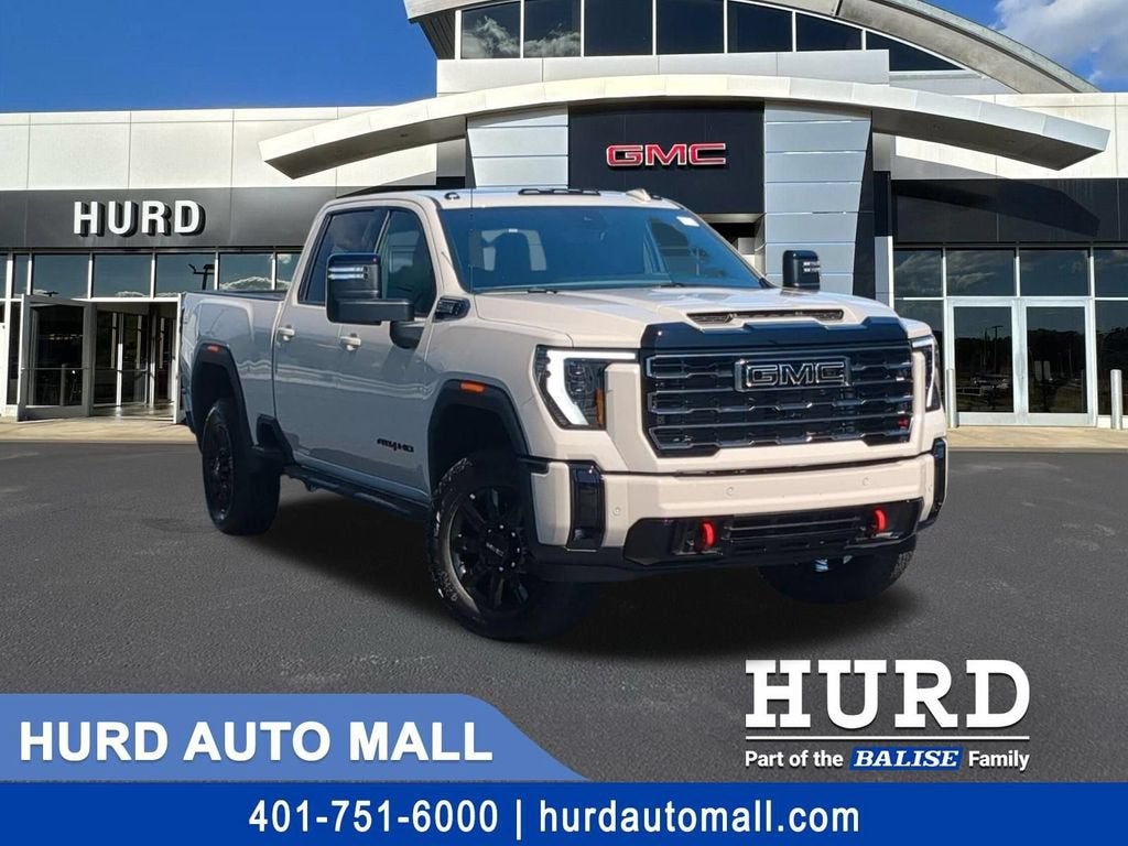 2026 GMC Sierra 2500 HD AT4 in Coastal Dune — front three-quarter view
