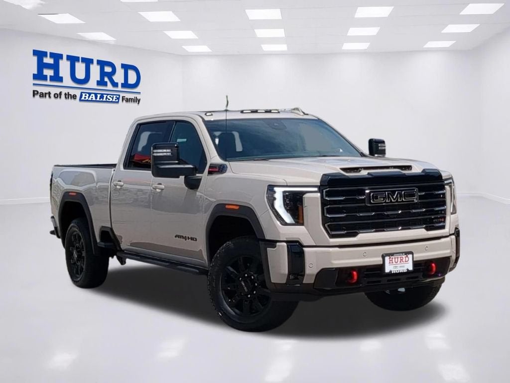 2026 GMC Sierra 2500 HD AT4 in Coastal Dune — front three-quarter view