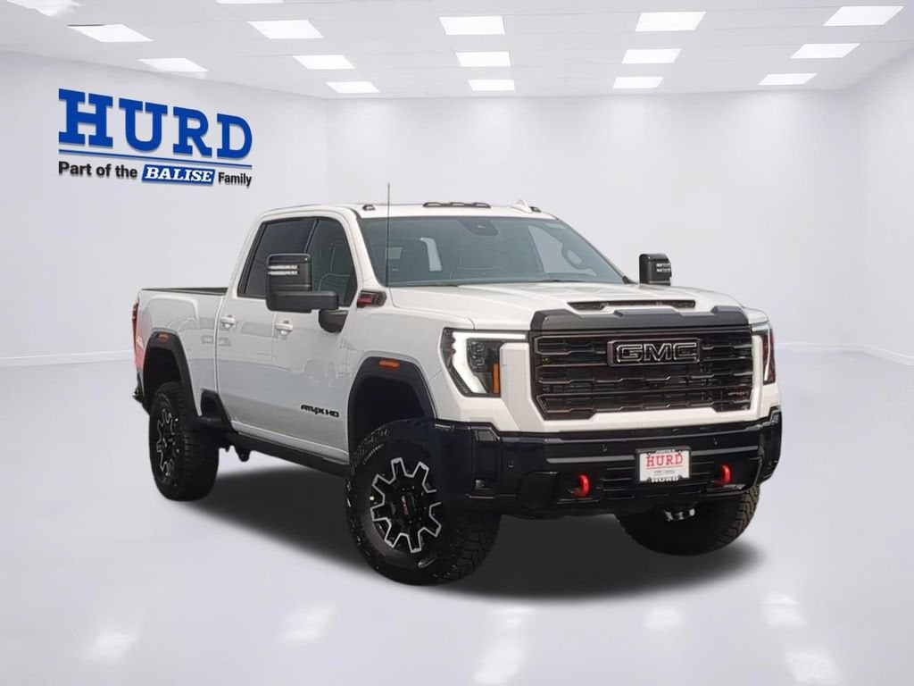 2026 GMC Sierra 2500 HD AT4X in Summit White — front three-quarter view