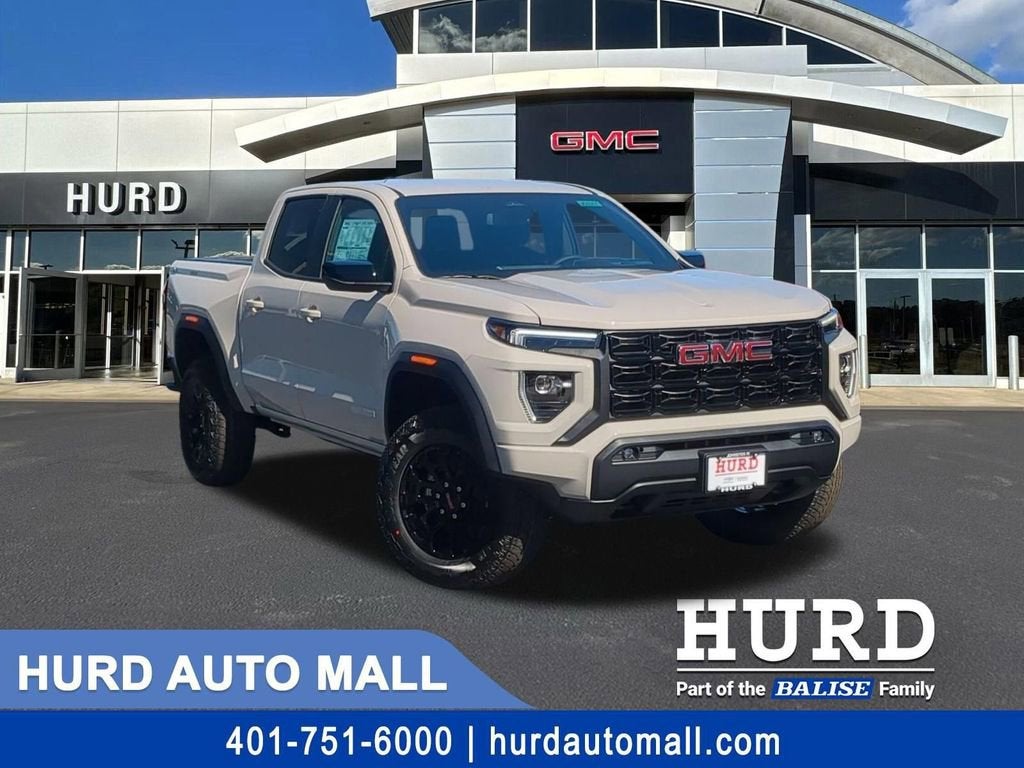 2026 GMC Canyon Elevation in Coastal Dune — front three-quarter view