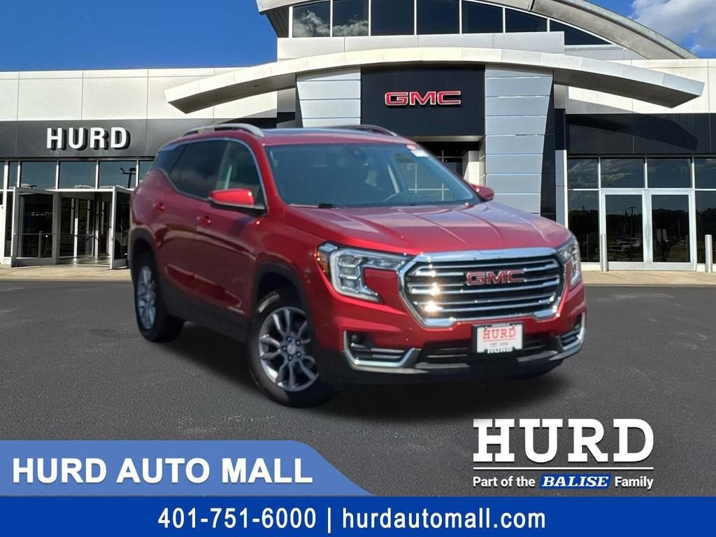 2024 GMC Terrain SLT in Volcanic Red Tintcoat — front three-quarter view