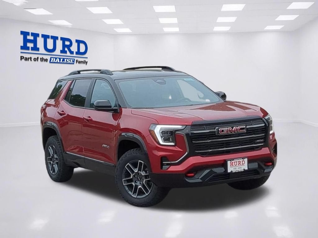 2026 GMC Terrain AT4 in Volcanic Red Tintcoat — front three-quarter view