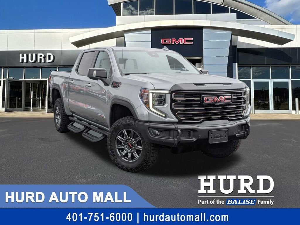 2026 GMC Sierra 1500 AT4X in Sterling Metallic — front three-quarter view