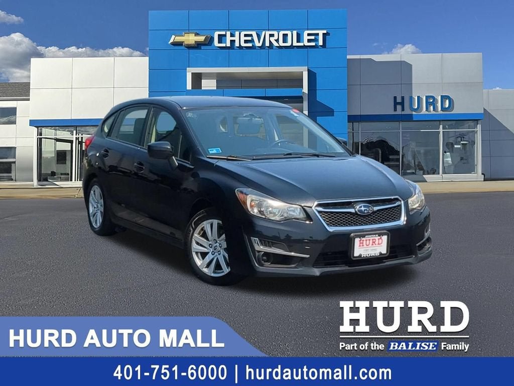 2016 Subaru Impreza Wagon 2.0i Premium in Crystal Black Silica — front three-quarter view